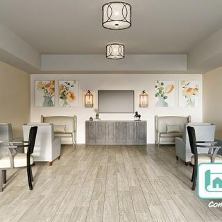 A modern interior seating area with elegant lighting and wall decorations.