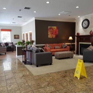 A cozy hotel lobby with comfortable seating and stylish decor.