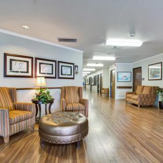 A spacious lobby area with comfortable seating and decor.