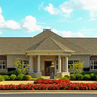A beautifully landscaped building with a welcoming entrance.