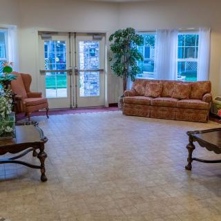 A cozy living room with comfortable seating and natural light.