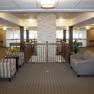 A modern lobby with comfortable seating and a cozy atmosphere.
