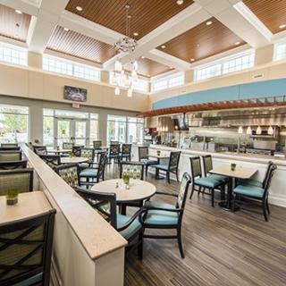 Modern restaurant interior with elegant seating and lighting.