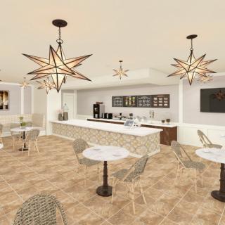 A modern cafe interior with stylish star-shaped pendant lights and minimalist furniture.