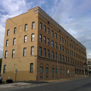 A historic brick building showcasing classic architectural features.