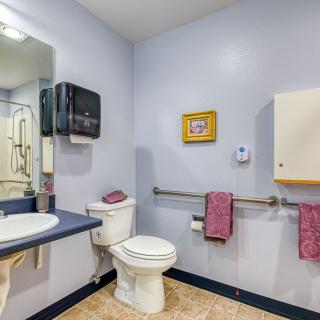 A clean and accessible bathroom equipped with essential amenities.