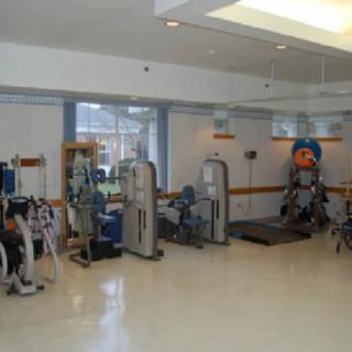A well-equipped indoor gym with various exercise machines and equipment.