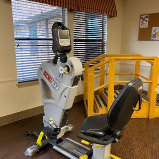 A seated exercise bike designed for rehabilitation and physical therapy.