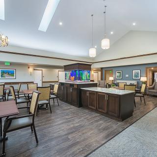 A modern dining area with comfortable seating and stylish lighting.