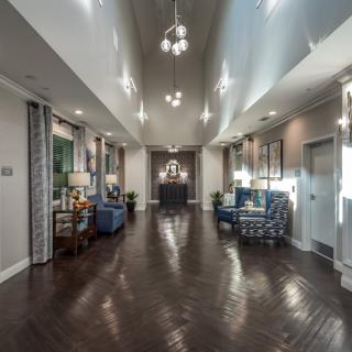 A modern lobby area with stylish furniture and elegant lighting.