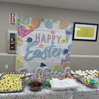 A cheerful Easter celebration setup with vibrant decorations and festive treats.