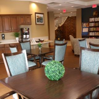A spacious and inviting lobby area featuring modern furniture and a cozy atmosphere.