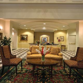Elegant hotel lobby with comfortable seating and stylish decor.