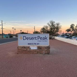 Sign for Desert Peak during a beautiful sunset.