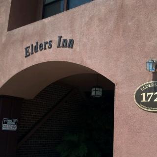 Entrance to Elders Inn with visible signage and address.