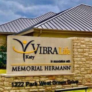 Entrance sign for Vibra Life in association with Memorial Hermann, located at 1222 Park West Green Drive.