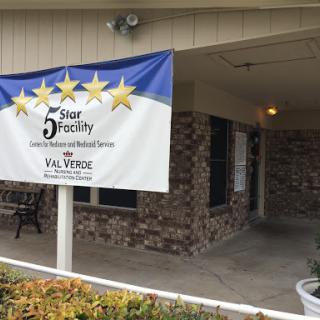 A banner indicating the facility's 5-star rating, prominently displayed at the entrance.