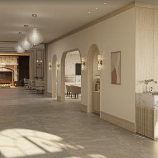 A modern and elegantly designed hallway with soft lighting and minimalist furnishings.