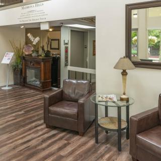 A cozy lobby with comfortable seating and elegant decor.