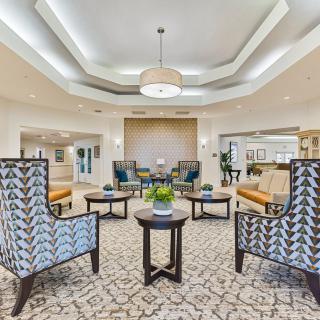 A spacious and elegantly designed lobby area with comfortable seating arrangements and stylish decor.