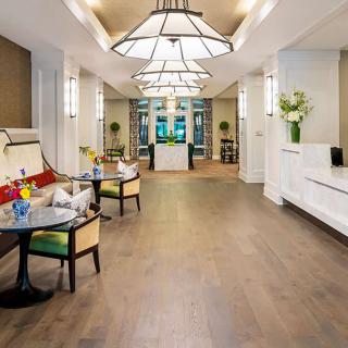 A modern and spacious lobby with elegant lighting and comfortable seating.
