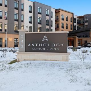 A photo of Anthology Senior Living building surrounded by snow.