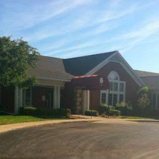 A charming residential building basking in the sunlight.