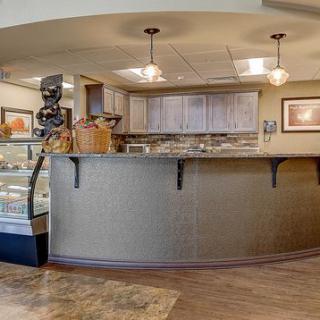 A modern reception desk in an office setting.