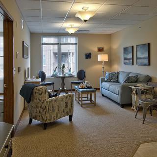 A cozy living room with comfortable seating and tasteful decor.