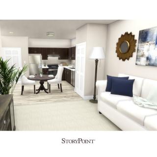 A modern open-concept living room and kitchen with elegant furnishings.