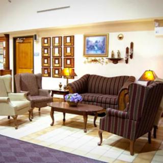 A cozy lobby area with stylish seating and warm lighting.