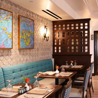 Cozy restaurant interior with stylish decor and comfortable seating.
