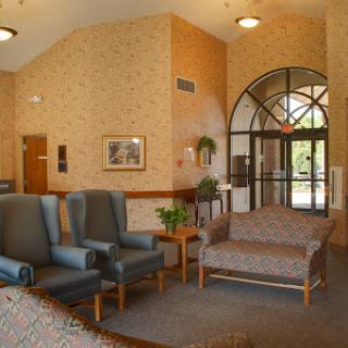 A welcoming lobby area featuring comfortable seating and an inviting entrance.
