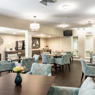 A modern dining area with comfortable seating and elegant decor.