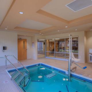 A serene indoor pool area designed for relaxation and wellness.