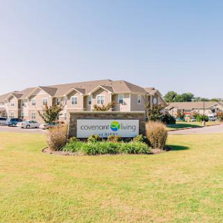 A bright and welcoming day at a residential apartment complex.