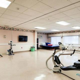 A rehabilitation center equipped with exercise machines and therapy facilities.