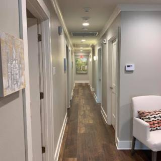 A well-lit hallway showcasing a modern interior design.
