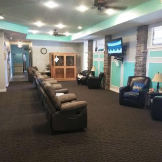 A spacious and modern waiting room with comfortable seating and a welcoming atmosphere.