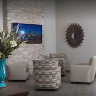 A modern lobby with comfortable seating and stylish decor.