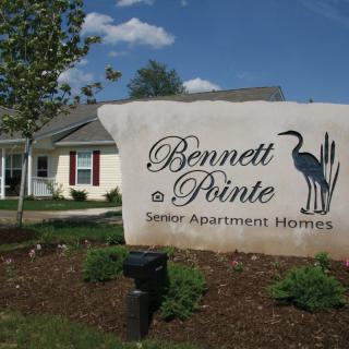 Entrance sign for Bennett Pointe Senior Apartment Homes.