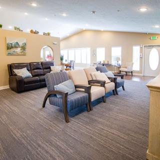 A cozy living room with comfortable seating and modern decor.