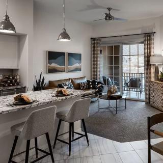 Modern open-concept living and dining space with stylish decor.