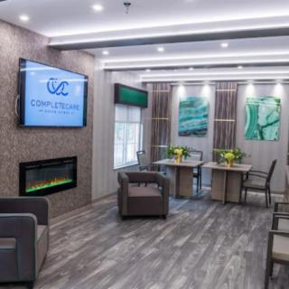 A modern waiting room with comfortable seating and stylish decor.