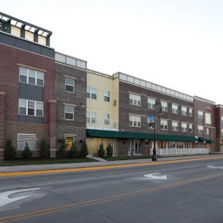 A multi-story commercial building in an urban setting.