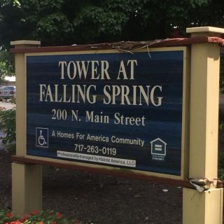 Sign for Tower at Falling Spring, an address indicating a community building.
