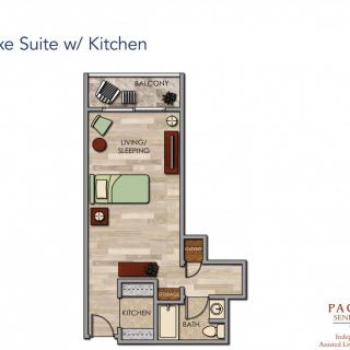 Floor plan of a studio suite with kitchen, featuring a living area, bed, and bathroom.