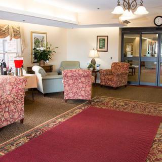 A cozy lobby with comfortable seating and elegant decor.