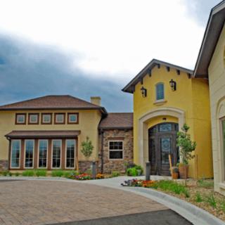A modern residential house with a stylish exterior and well-maintained surroundings.