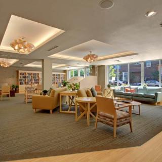 A modern lobby area with comfortable seating and ample natural light.